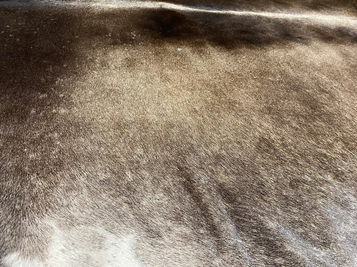 Arlo - Black + Brown speckle cowhide close up