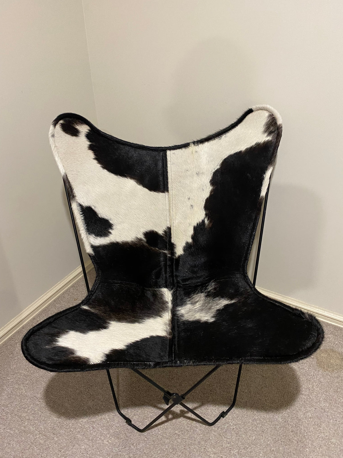 WHITE + BLACK COWHIDE BUTTERFLY CHAIR