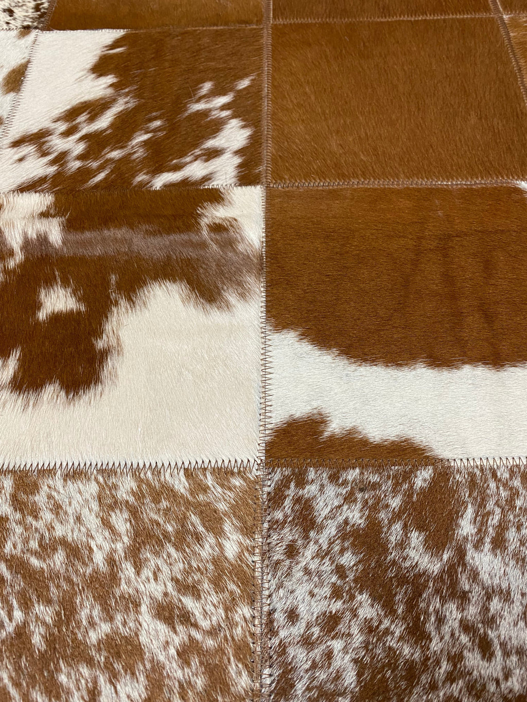 Brown & White Patchwork rug close up