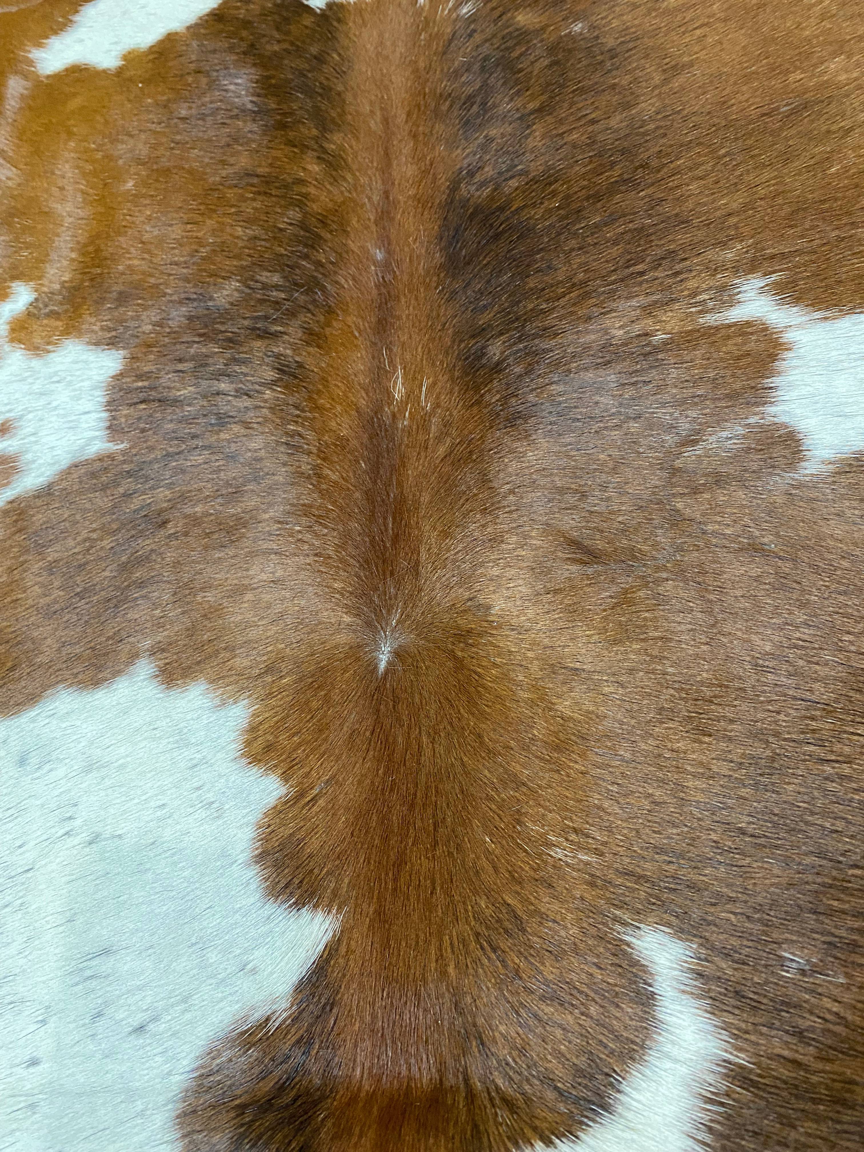 Ruth - White + Brown cowhide close up